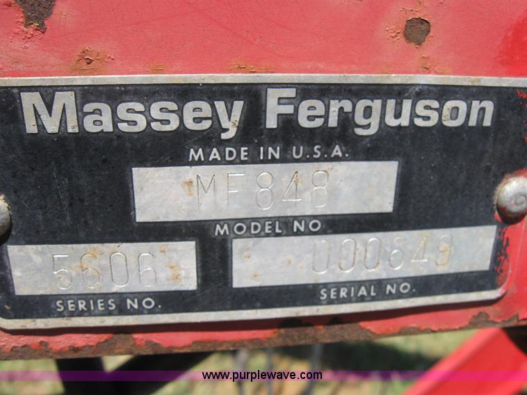 image for item 2659 Massey-Ferguson 848 loader with Dual 94 grapple