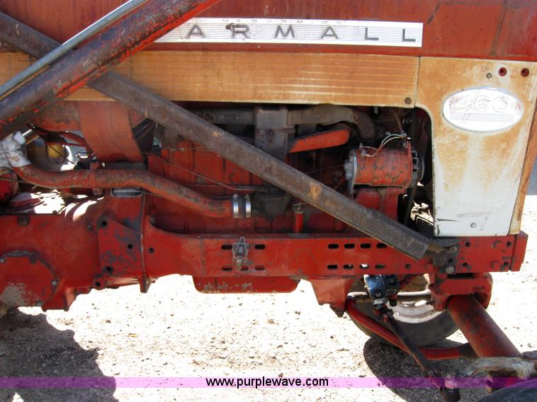 image for item 2692 Farmall 460 tractor with Farmhand F-11 loader and bale grapple