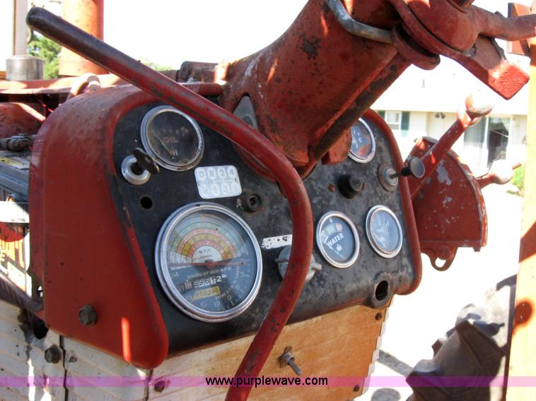 image for item 2692 Farmall 460 tractor with Farmhand F-11 loader and bale grapple