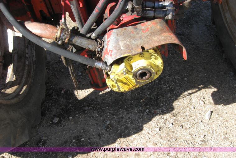 image for item 2692 Farmall 460 tractor with Farmhand F-11 loader and bale grapple