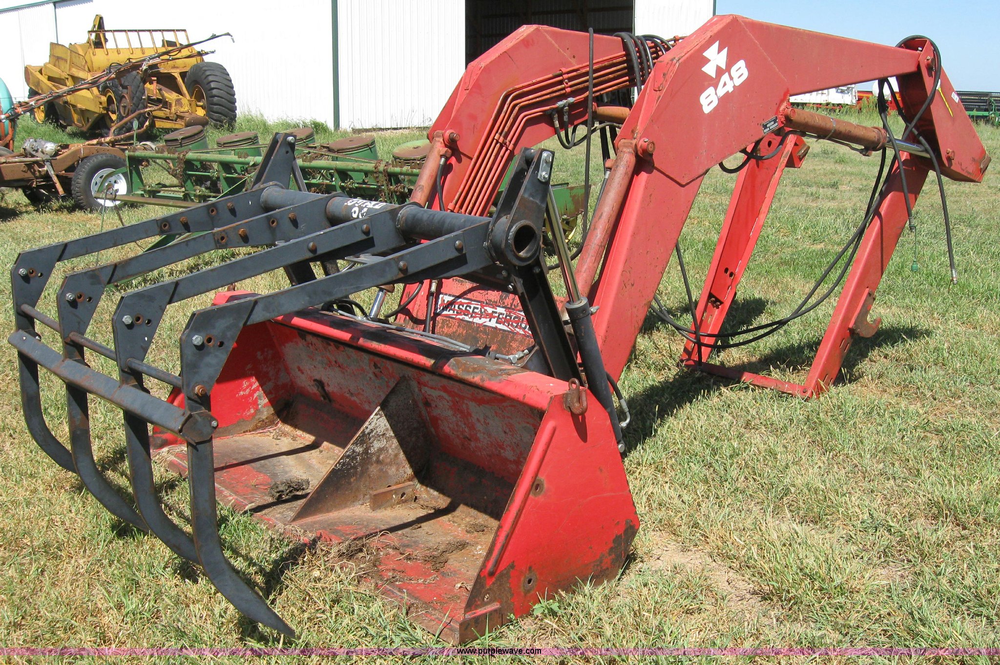 MasseyFerguson 848 loader with Dual 94 grapple in Beloit, KS Item