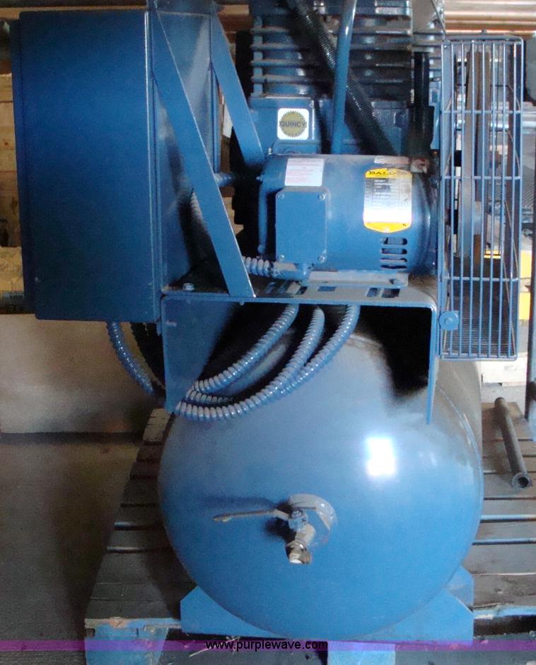 image for item 2599 Low pressure, high volume air compressor and an additional tank