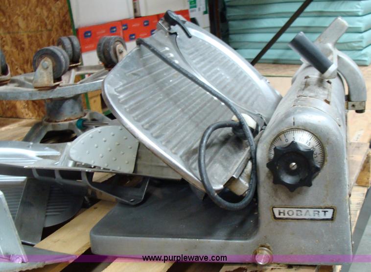 image for item 2606 Hobart slicer and mixing bowl stand on wheels