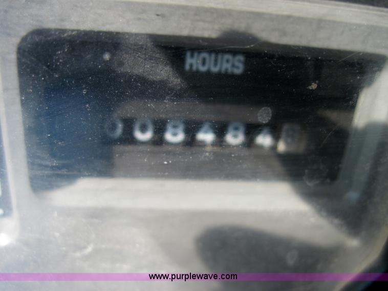 image for item 4035 2000 International Series 4700 dump truck