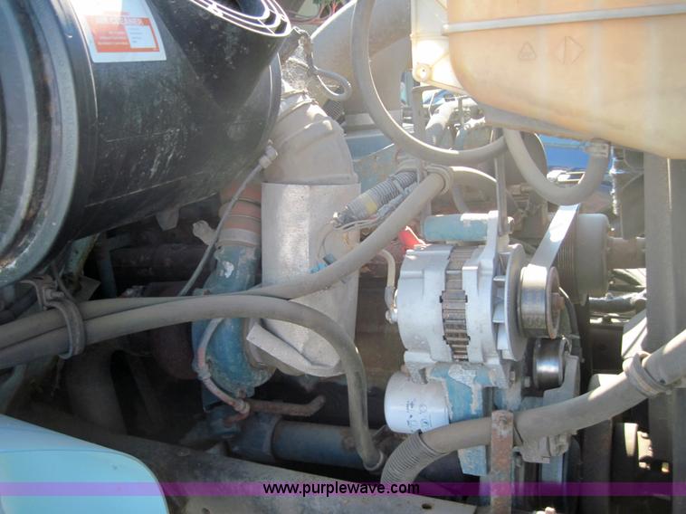 image for item 4035 2000 International Series 4700 dump truck