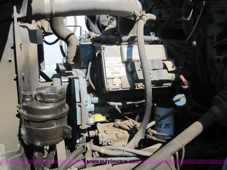 image for item 4035 2000 International Series 4700 dump truck