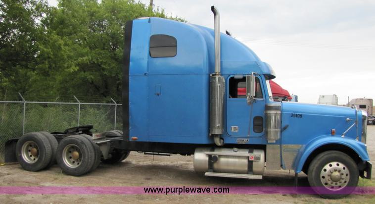 image for item 3090 2003 Freightliner Conventional FLD132 XL Classic semi truck