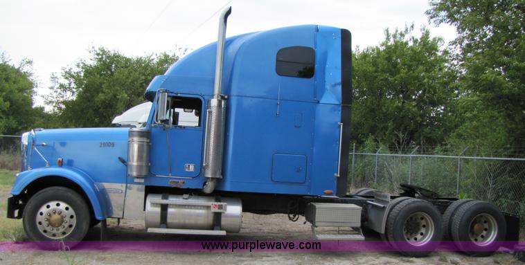 image for item 3090 2003 Freightliner Conventional FLD132 XL Classic semi truck