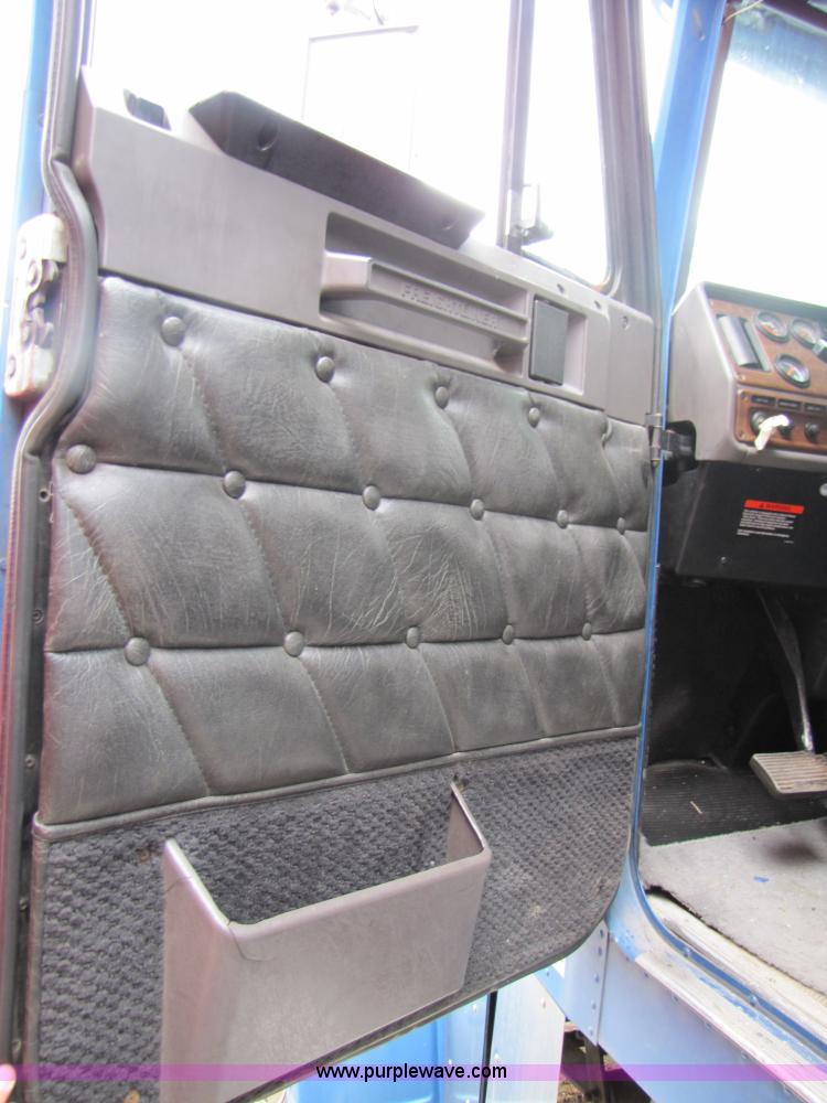 image for item 3090 2003 Freightliner Conventional FLD132 XL Classic semi truck