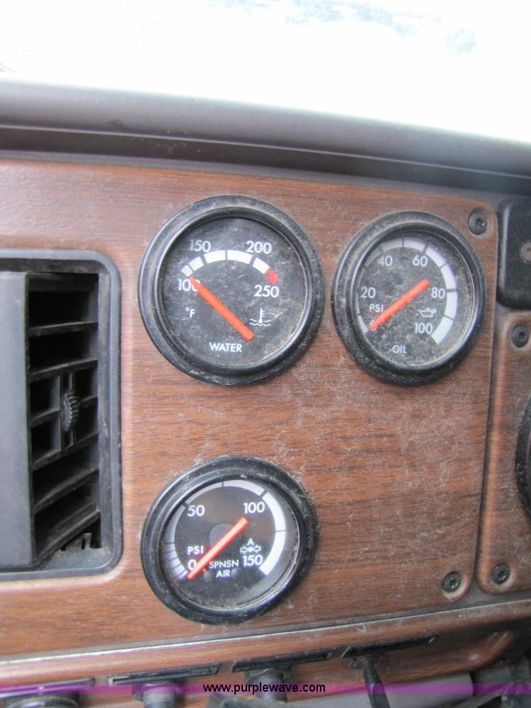 image for item 3090 2003 Freightliner Conventional FLD132 XL Classic semi truck