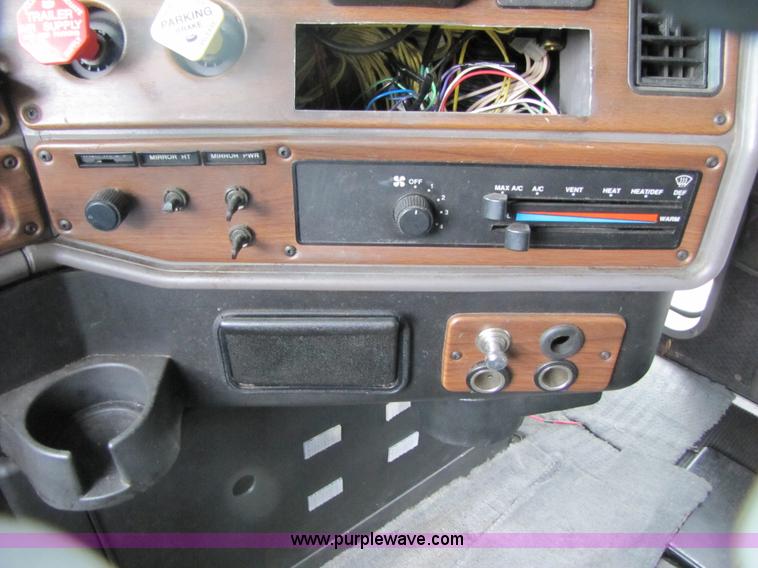 image for item 3090 2003 Freightliner Conventional FLD132 XL Classic semi truck