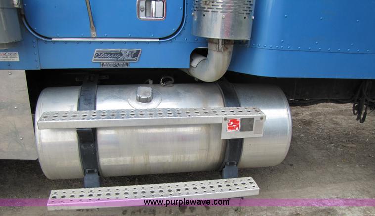 image for item 3090 2003 Freightliner Conventional FLD132 XL Classic semi truck