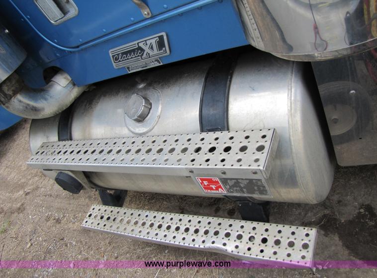 image for item 3090 2003 Freightliner Conventional FLD132 XL Classic semi truck