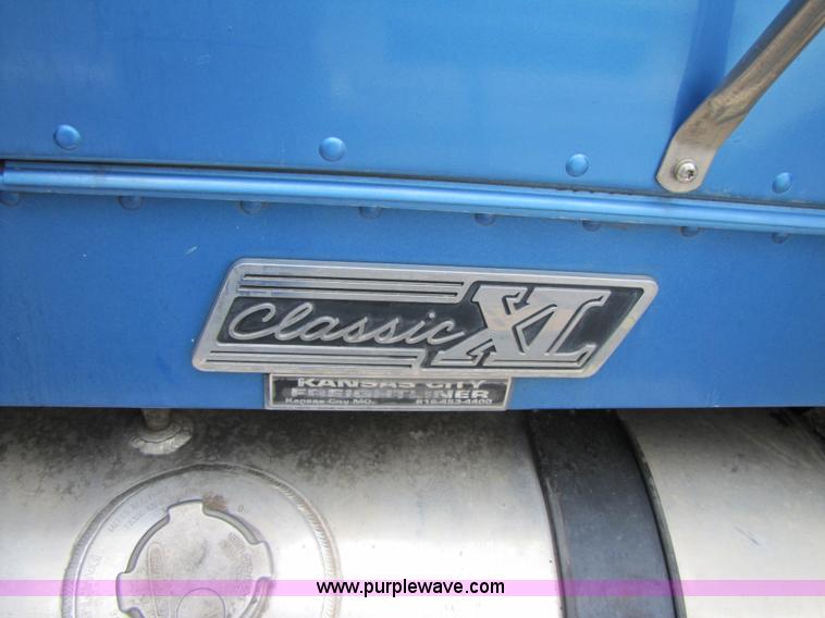 image for item 3090 2003 Freightliner Conventional FLD132 XL Classic semi truck