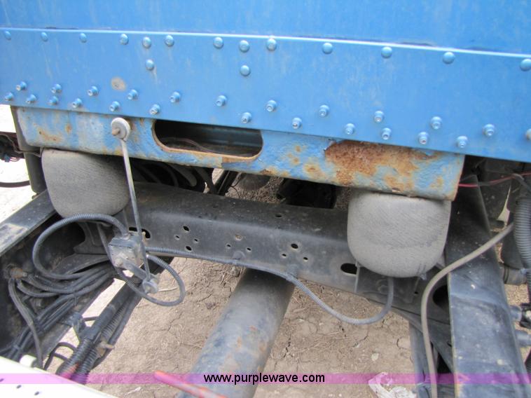 image for item 3090 2003 Freightliner Conventional FLD132 XL Classic semi truck