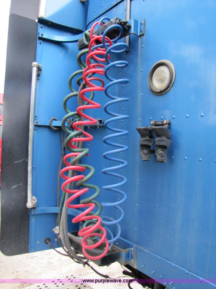 image for item 3090 2003 Freightliner Conventional FLD132 XL Classic semi truck