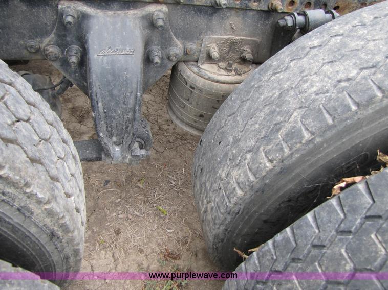 image for item 3090 2003 Freightliner Conventional FLD132 XL Classic semi truck