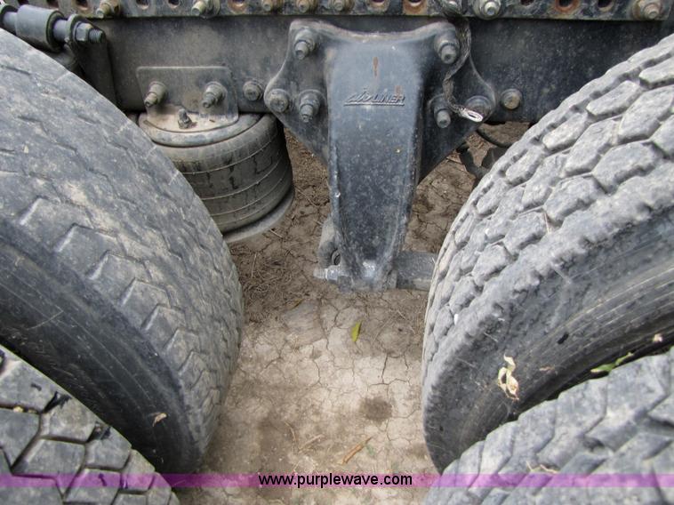 image for item 3090 2003 Freightliner Conventional FLD132 XL Classic semi truck