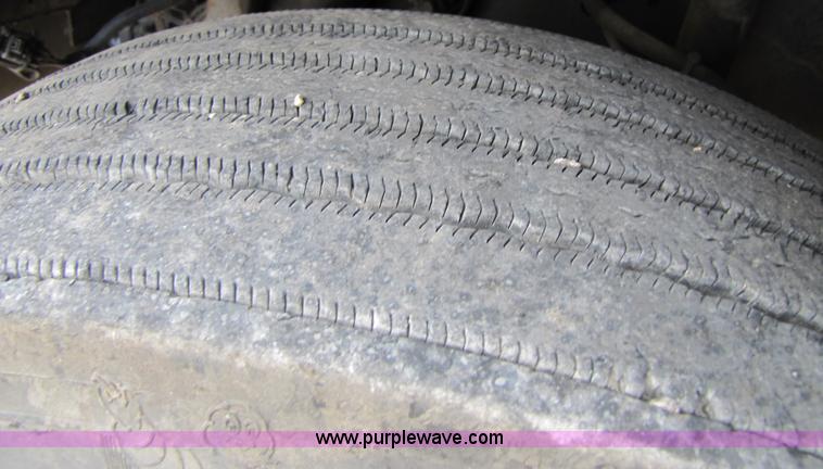 image for item 3090 2003 Freightliner Conventional FLD132 XL Classic semi truck