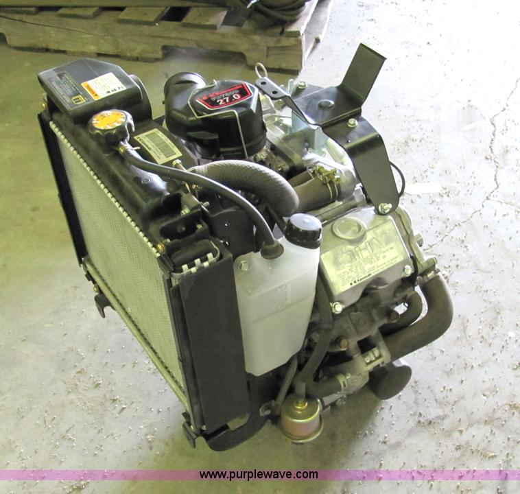 image for item 2116 (4) new Kawasaki gas engine