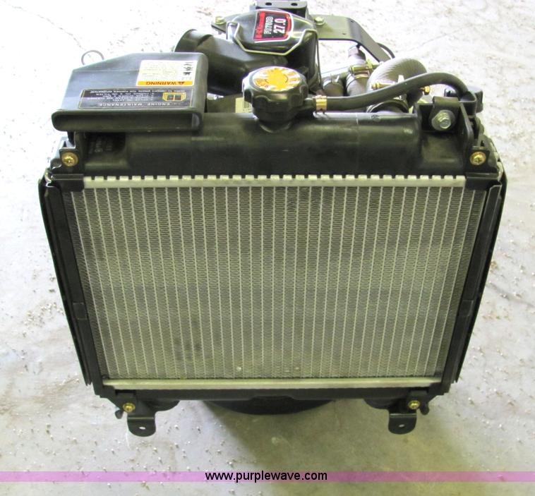 image for item 2116 (4) new Kawasaki gas engine