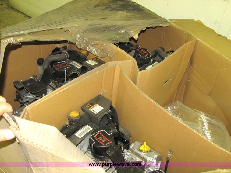 image for item 2116 (4) new Kawasaki gas engine