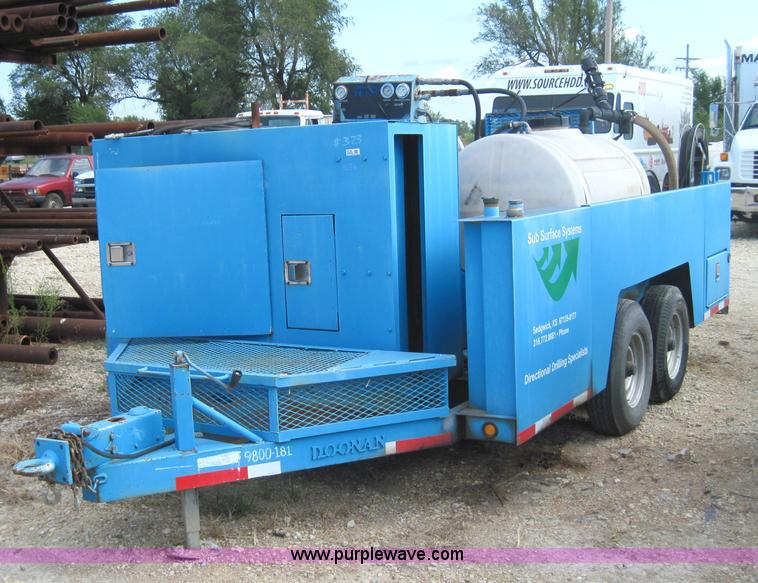 image for item 4136 2003 Doonan flatbed tandem axle trailer