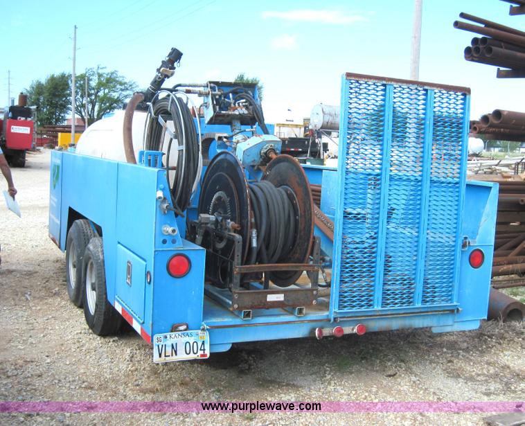 image for item 4136 2003 Doonan flatbed tandem axle trailer