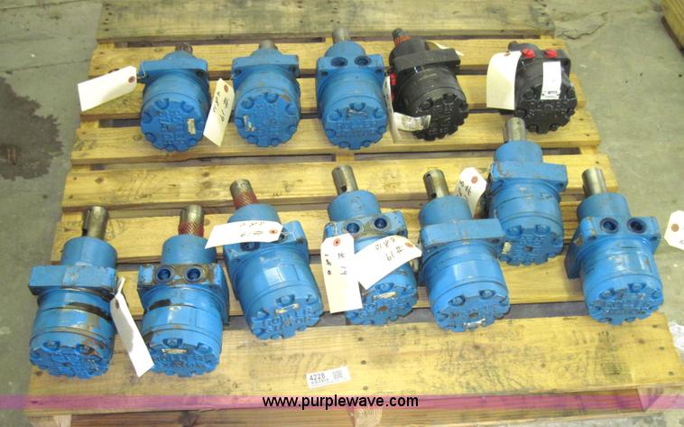 image for item 4228 (12) White hydraulic roller drive motors