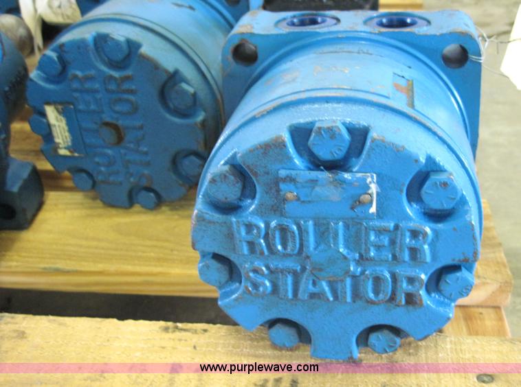 image for item 4228 (12) White hydraulic roller drive motors