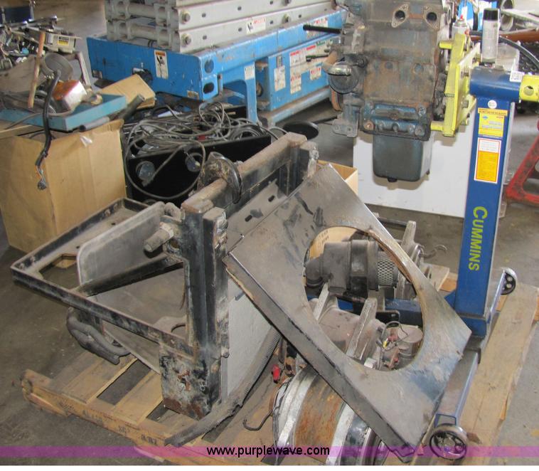 image for item 2194 Cummins 750 lbs capacity engine stand with Kubota engine and assorted parts