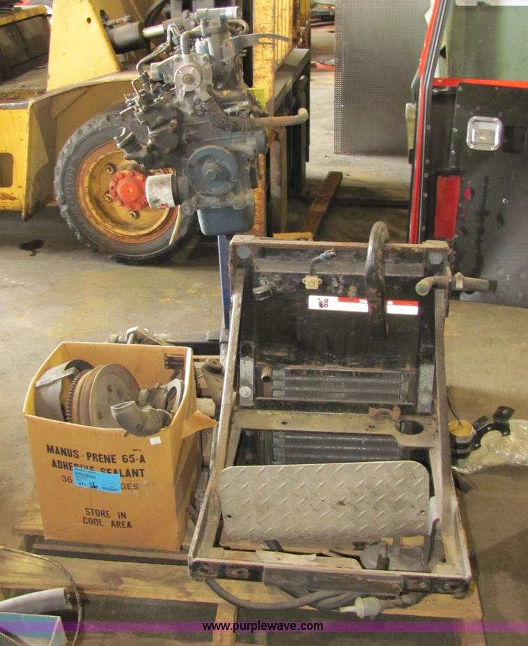 image for item 2194 Cummins 750 lbs capacity engine stand with Kubota engine and assorted parts