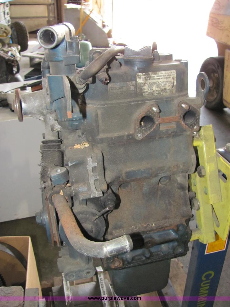 image for item 2194 Cummins 750 lbs capacity engine stand with Kubota engine and assorted parts