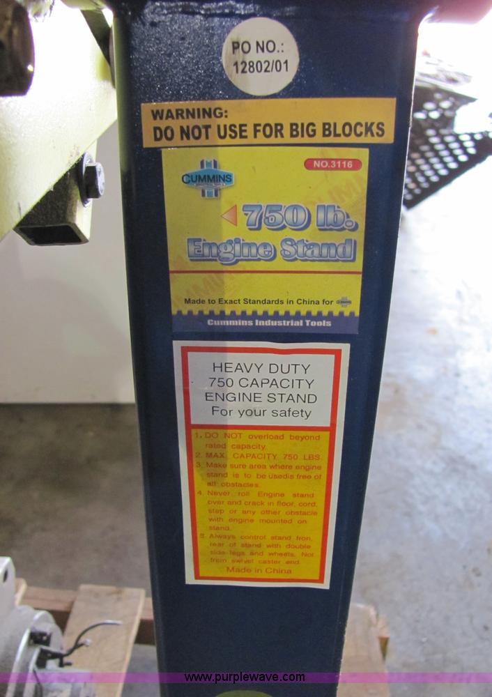 image for item 2194 Cummins 750 lbs capacity engine stand with Kubota engine and assorted parts
