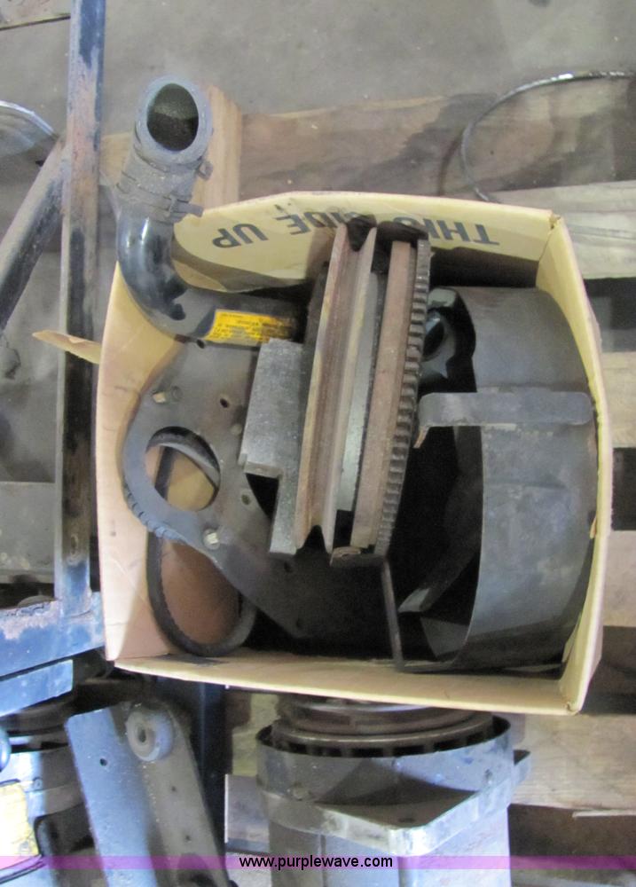 image for item 2194 Cummins 750 lbs capacity engine stand with Kubota engine and assorted parts