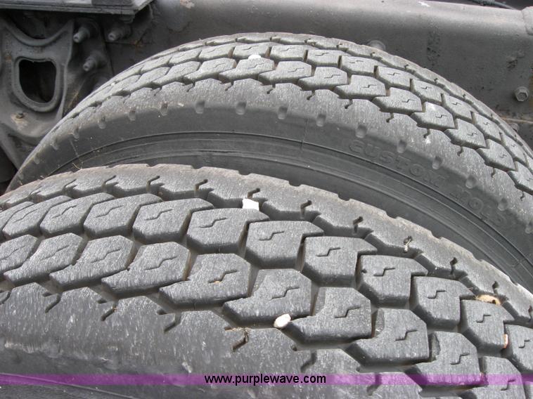 image for item 7144 1999 International Series 9400 semi truck