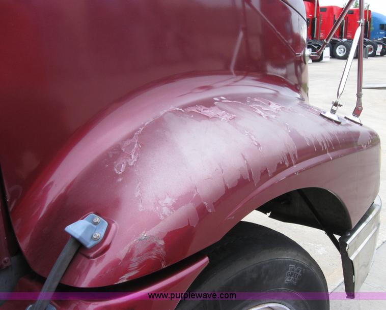 image for item 7144 1999 International Series 9400 semi truck