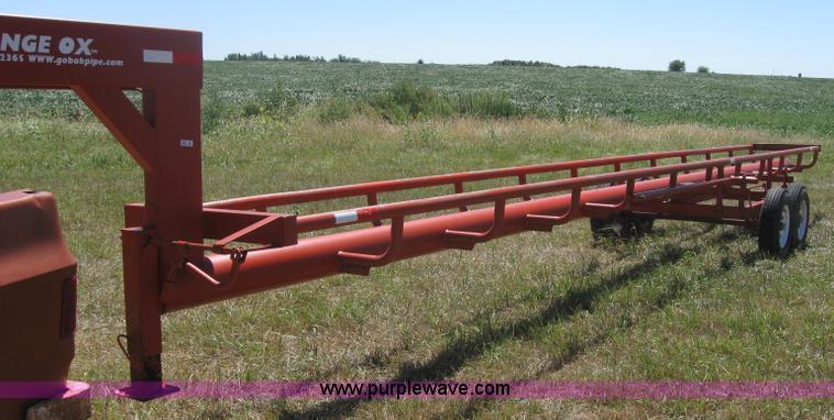 image for item 2764 Orange Ox round bale trailer