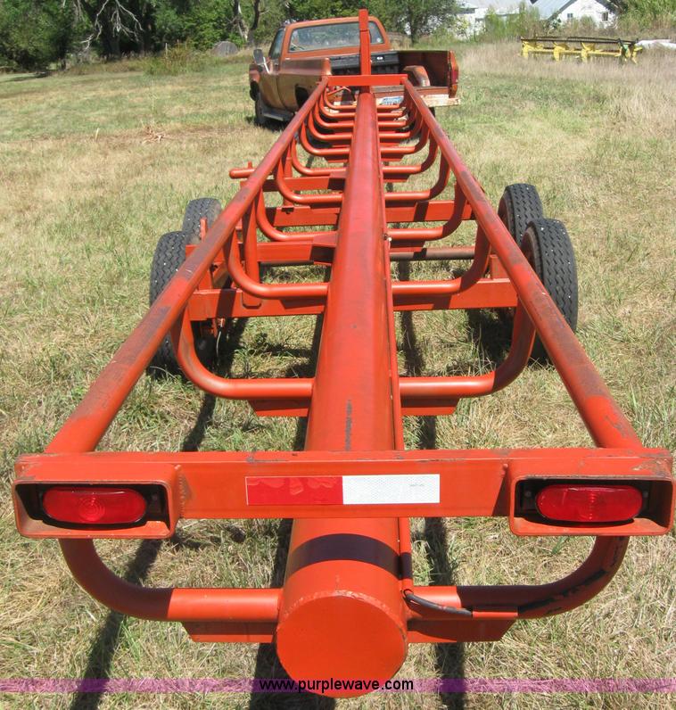 image for item 2764 Orange Ox round bale trailer