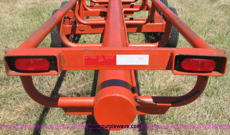image for item 2764 Orange Ox round bale trailer