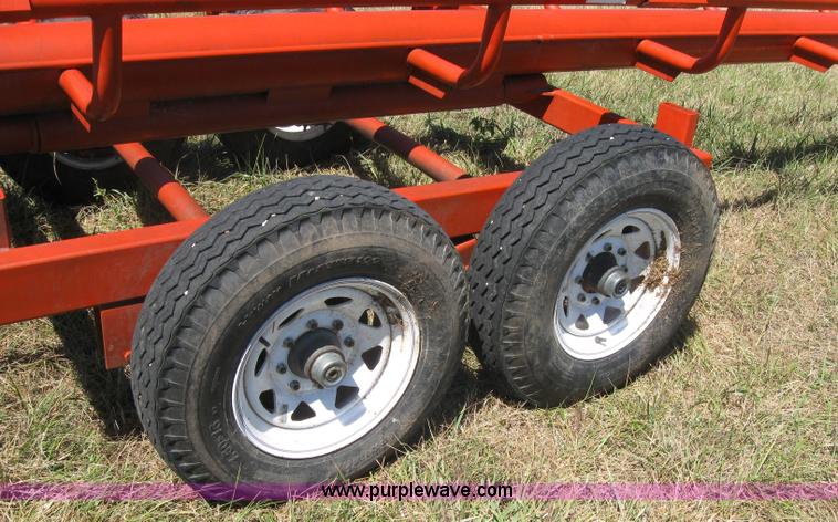 image for item 2764 Orange Ox round bale trailer