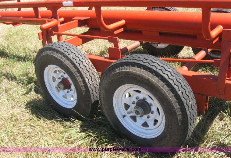 image for item 2764 Orange Ox round bale trailer