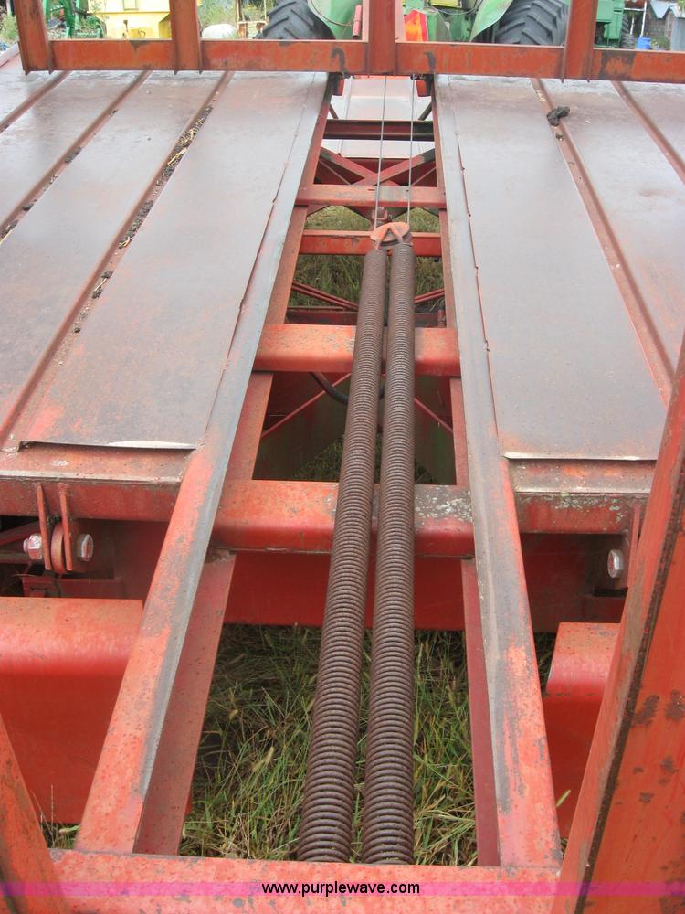 image for item 2794 New Holland Stackliner 1033 bale wagon