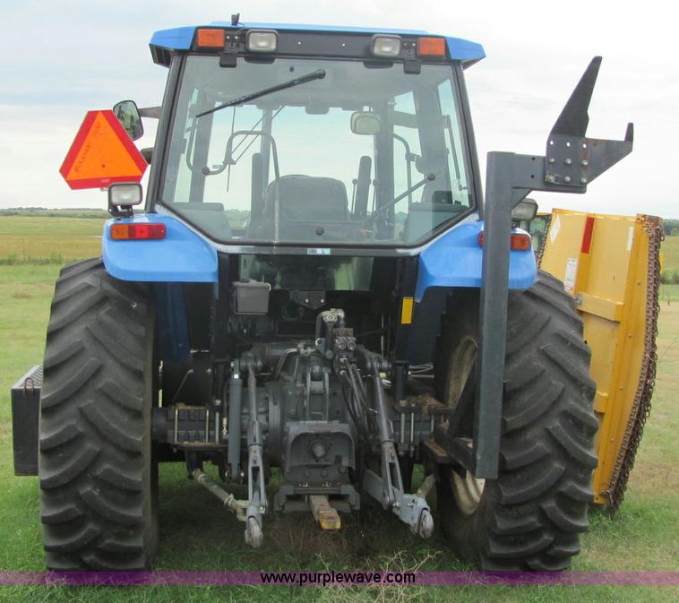 image for item 6942 2002 New Holland TS100 tractor with side-boom mower