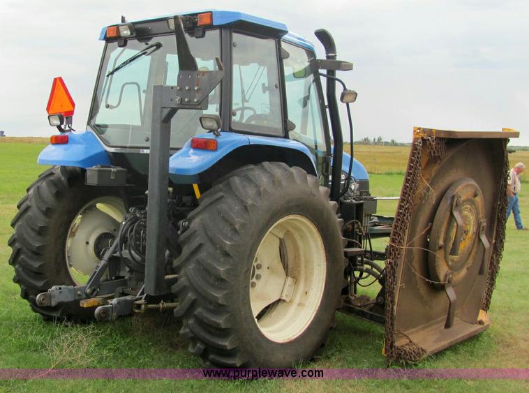image for item 6942 2002 New Holland TS100 tractor with side-boom mower