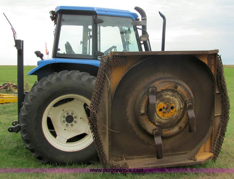 image for item 6942 2002 New Holland TS100 tractor with side-boom mower