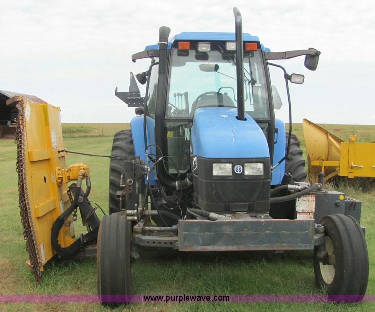 image for item 6942 2002 New Holland TS100 tractor with side-boom mower