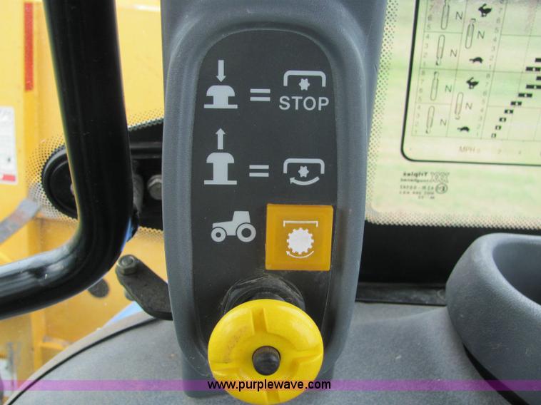 image for item 6942 2002 New Holland TS100 tractor with side-boom mower