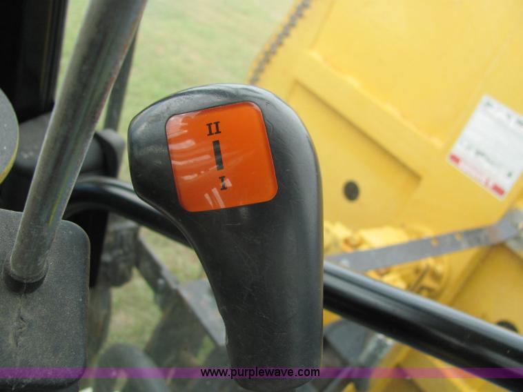 image for item 6942 2002 New Holland TS100 tractor with side-boom mower