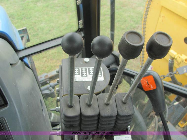 image for item 6942 2002 New Holland TS100 tractor with side-boom mower